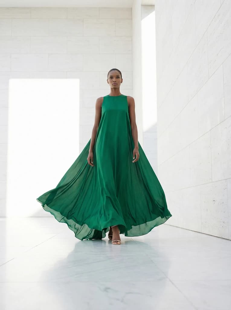 AI-generated fashion editorial — woman in flowing green dress